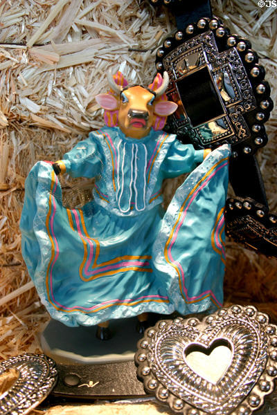 Figurine of cow in fiesta dress. San Antonio, TX.