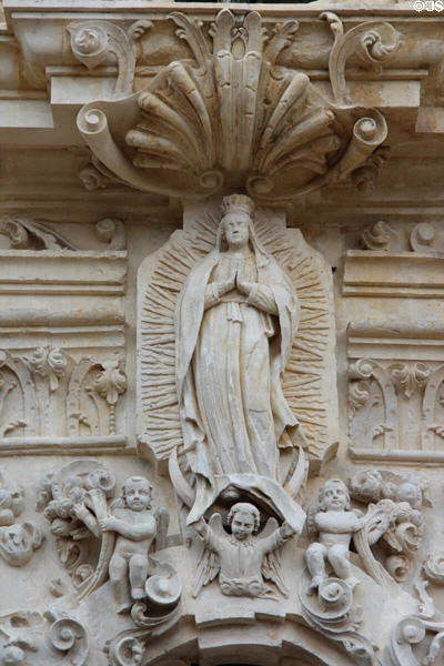 Our Lady over Baroque portal of Mission San José. San Antonio, TX.