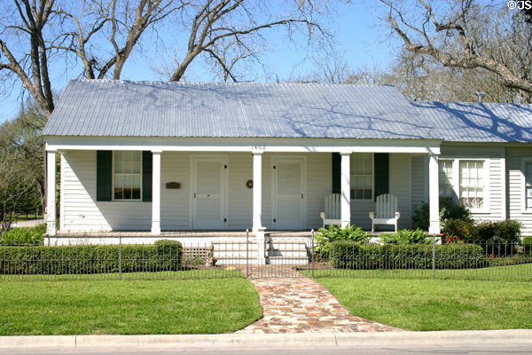 Tin roofed double house (1402 Main St.). Bastrop, TX.