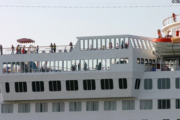 Cruise ship Ecstacy windows & people. Galveston, TX.