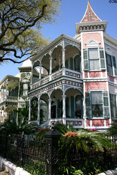 Victorian arcaded house (1887) (1802 Postoffice) with red tower. Galveston, TX.