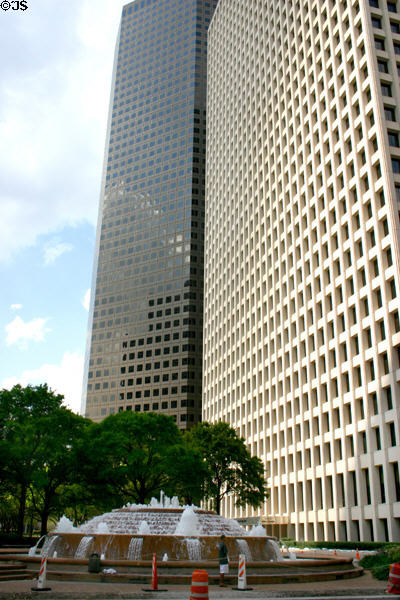 Allen Center (1980) (50 floors) + Devon Energy Center (1978) (36 floors) (1200 Smith St.) over Smith fountain. Houston, TX. Architect: Lloyd Jones Brewer & Assoc..