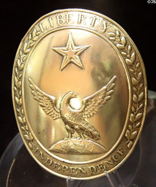 Brass uniform plate (c1836) reading Liberty, Independence, Texas at San Jacinto Monument museum. San Jacinto, TX.