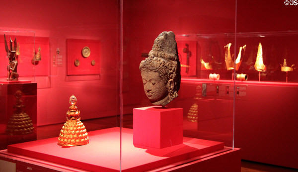 Gallery of Javanese art with head of deity (9thC) carved from volcanic stone at Museum of Fine Arts, Houston. Houston, TX.