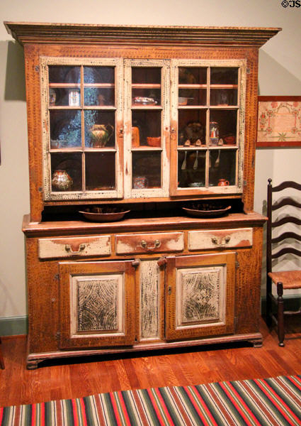 Rustic Germanic stenciled cupboard (early 19thC) from Berks County, PA in Folk Art room at Bayou Bend. Houston, TX.