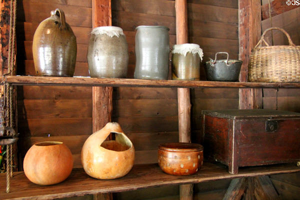 Stoneware crocks, boxes, baskets & gourds in Old Place at Sam Houston Park. Houston, TX.