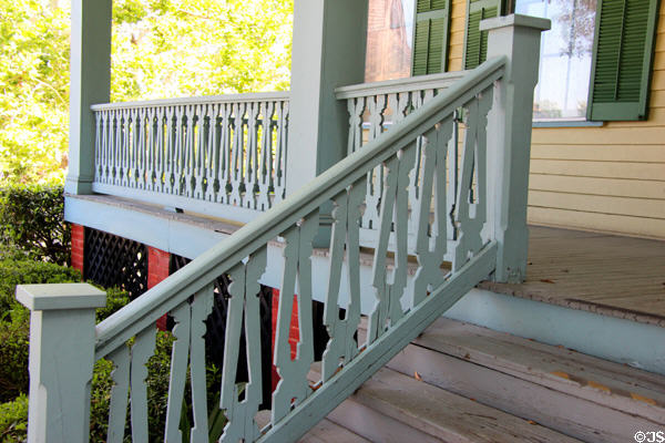 Porch railing on San Felipe Cottage at Sam Houston Park. Houston, TX.