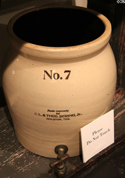 Stoneware water jar made for C.I. & Theo. Bering, Jr. of Houston, TX in General Store at Sam Houston Park. Houston, TX.