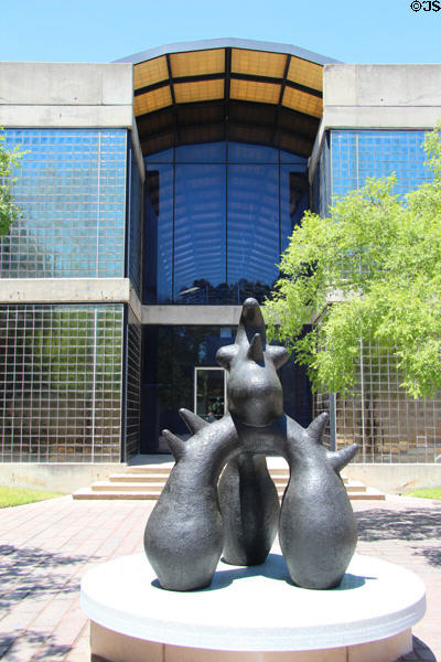 Bird bronze sculpture (1968-81) by Joan Miró at Cullen Sculpture Garden of Museum of Fine Arts, Houston with Glassell School of Art beyond. Houston, TX.
