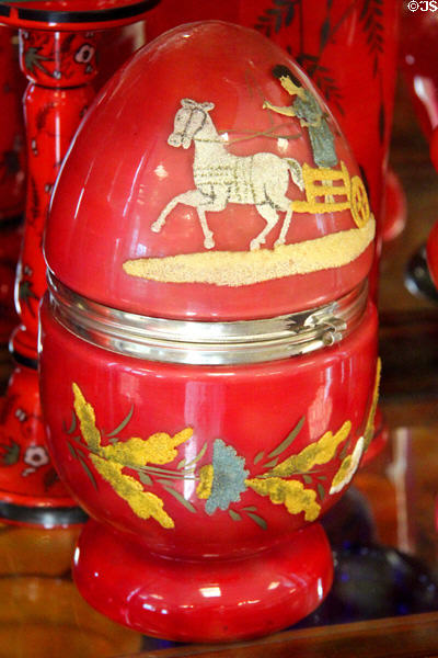 Red Czech glass egg-shaped box with horse & buggy design at Czech Cultural Center. Houston, TX.