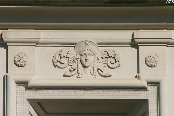 Main Building detail of classical figure with Texas star. Austin, TX.