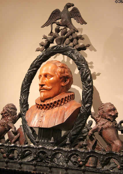 Bust of Cervantes under Mexican symbol of eagle & snake carved atop desk (c1838) from Veracruz, Mexico at San Antonio Museum of Art. San Antonio, TX.