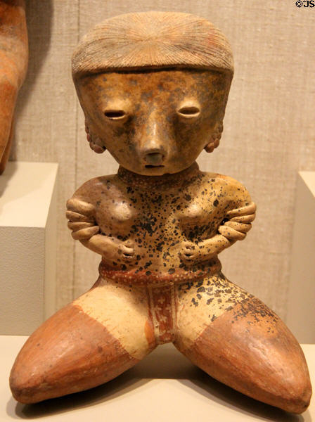 Nayarit culture earthenware seated female figure (200 BCE-300 CE) from West Coast Mexico at San Antonio Museum of Art. San Antonio, TX.