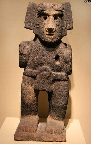Aztec culture volcanic stone standing male figure (c1500) from Mexico at San Antonio Museum of Art. San Antonio, TX.