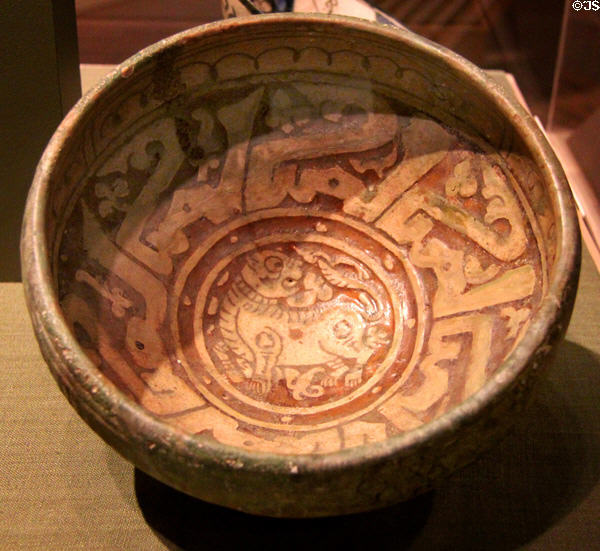 Earthenware bowl depicting lion (12-13th C) from Iran at San Antonio Museum of Art. San Antonio, TX.