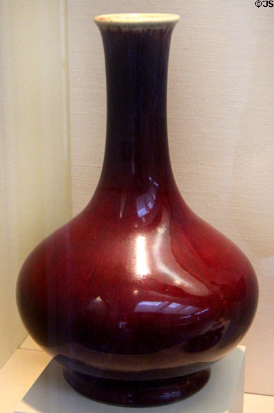 Qing dynasty stoneware ox-blood bottle vase (1736-95) from China at San Antonio Museum of Art. San Antonio, TX.