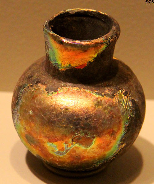 Ancient iridescent blown glass vase from Eastern Mediterranean at San Antonio Museum of Art. San Antonio, TX.