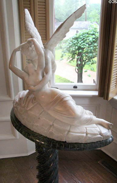 Marble statue of winged figure kissing woman at Edward Steves Homestead Museum. San Antonio, TX.