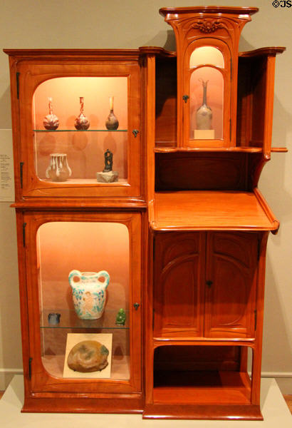 Art Nouveau writing desk & bookcase c1900-5 by Hector Guimard of France with French glass collection at McNay Art Museum. San Antonio, TX.