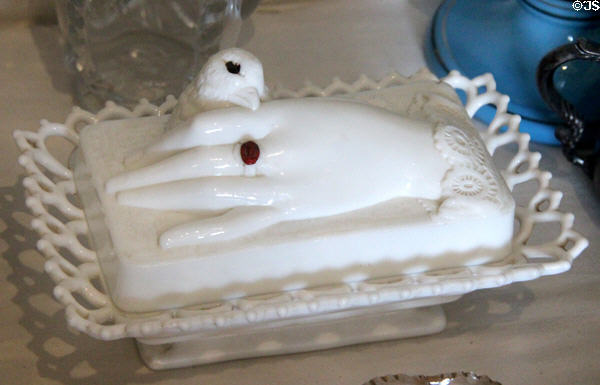 White-glass covered dish with hand & dove at Pioneer Museum. Fredericksburg, TX.