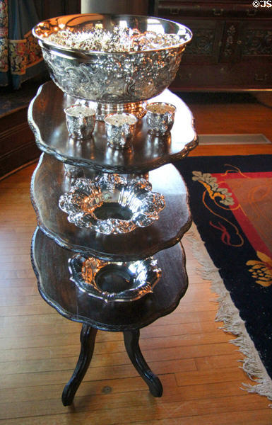 Étagère with silver punch bowl service in dining room at McFaddin-Ward House. Beaumont, TX.