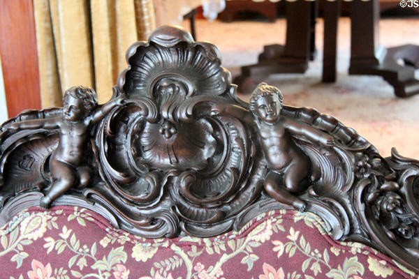 Detail of carved cherubs on sofa at Chambers House Museum. Beaumont, TX.