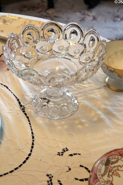 Glass compote on dining room table at Chambers House Museum. Beaumont, TX.