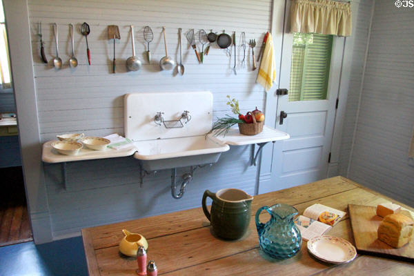Kitchen with original implements & sink with supported counters at Chambers House Museum. Beaumont, TX.