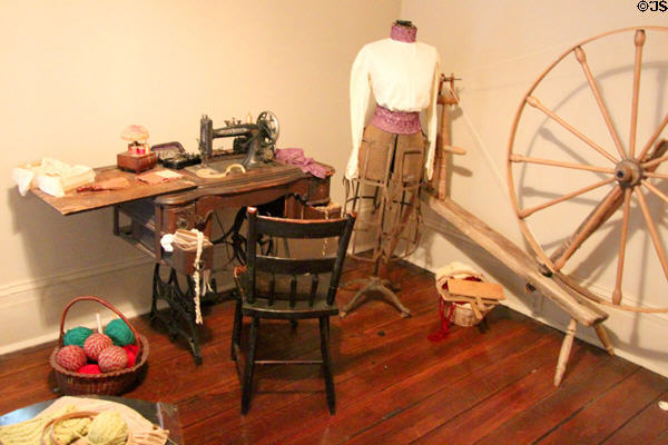 Sewing machine, dress dummy & spinning wheel at McCulloch House. Waco, TX.