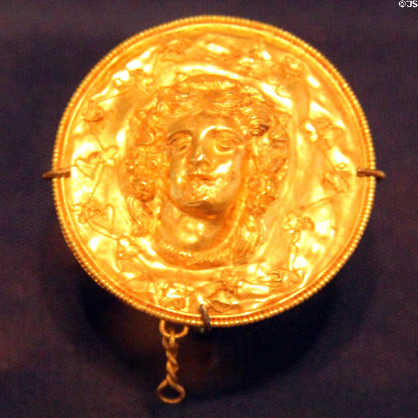 Greek gold medallion with head of Dionysos (3rdC BCE) at Dallas Museum of Art. Dallas, TX.