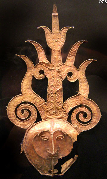 Gold headdress ornament with a human face (19thC) from Southeast Moluccas Islands, Indonesia at Dallas Museum of Art. Dallas, TX.