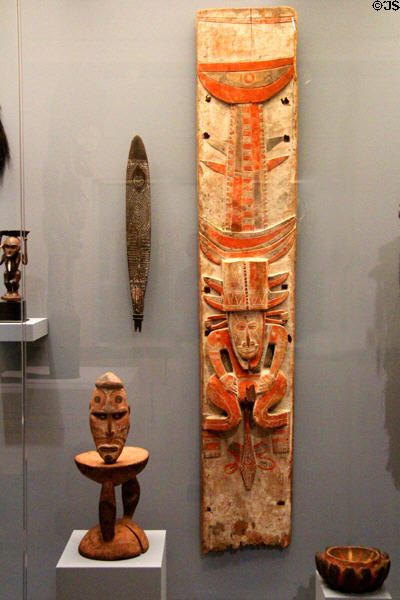 Gulf region bull-roarer, Sepik River debating stool, & Tami Islands architectural panel (late 19th-early 20thC) from Papua New Guinea at Dallas Museum of Art. Dallas, TX.