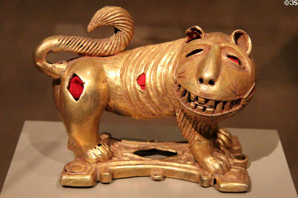 Cast gold sword ornament in form of lion (mid-20thC) by Assante culture of Ghana at Dallas Museum of Art. Dallas, TX.