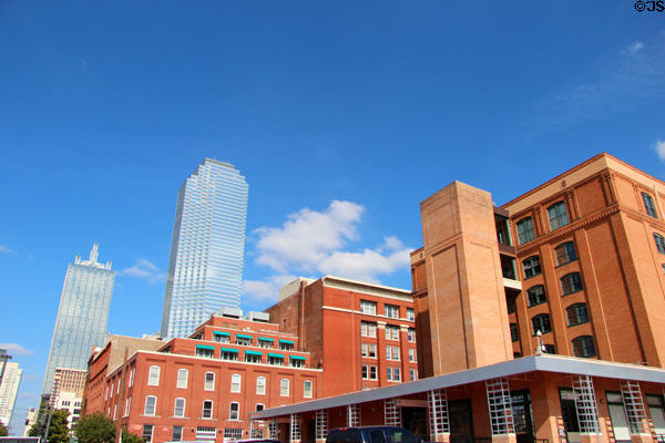 The Sixth Floor Museum at Dealey Plaza to right of downtown Dallas skyline. Dallas, TX.