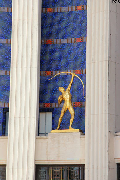 Tejas Warrior sculpture (1936) by Allie Victoria Tennant over entrance of Hall of State at Fair Park. Dallas, TX.