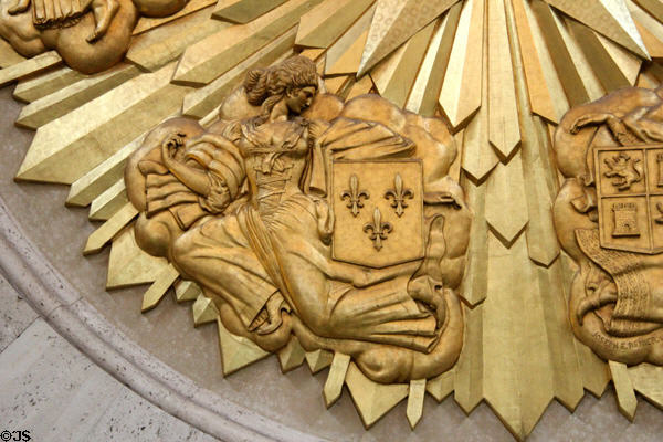 Symbol of France on six flags gold medallion by Joseph E. Renier in Great Hall of State at Fair Park. Dallas, TX.