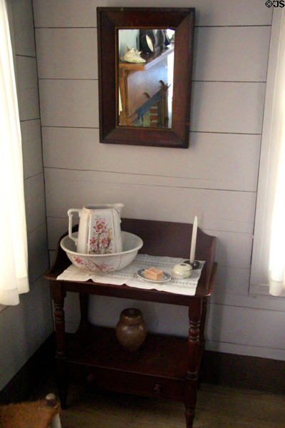 Wash stand & mirror in Mr. & Mrs. French's bedroom at John Jay French Museum. Beaumont, TX.