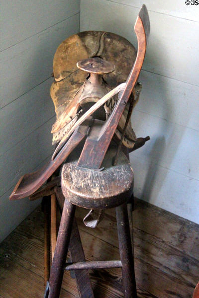 Stitching horse used by harness maker's to clamp leather being stitched at John Jay French Museum. Beaumont, TX.