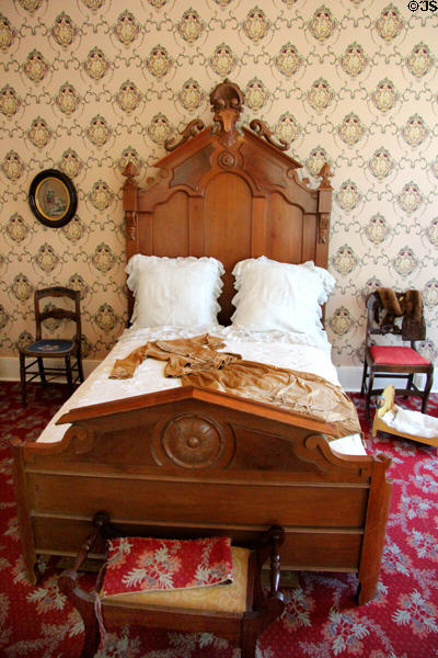 Carved Eastlake bedstead at Neill-Cochran House Museum. Austin, TX.