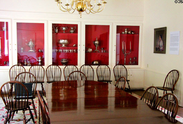 Meeting room with silver collection at Neill-Cochran House Museum. Austin, TX.