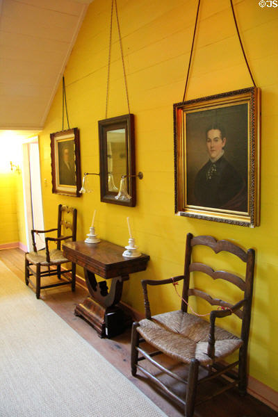 Hallway paintings & furniture at French Legation Museum. Austin, TX.