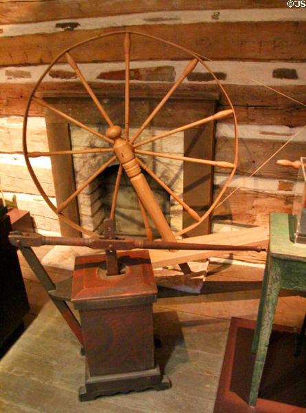 Spinning wheel (c1847) & butter churn (c1840) (lent: private collections) at Bullock Texas State History Museum. Austin, TX.