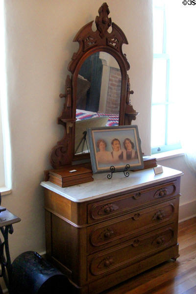 Chest of drawers with mirror at Susanna Dickinson Museum House. Austin, TX.