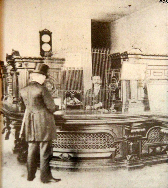 Photo of William Sydney Porter at his bank teller job (1891-4) at O. Henry Museum. Austin, TX.