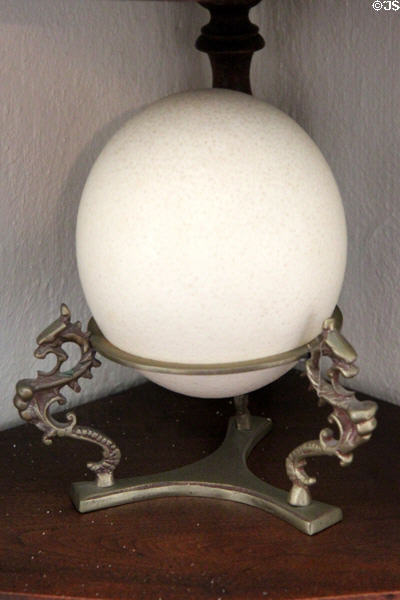 Ostrich egg in holder in Jahn House at Conservation Plaza. New Braunfels, TX.