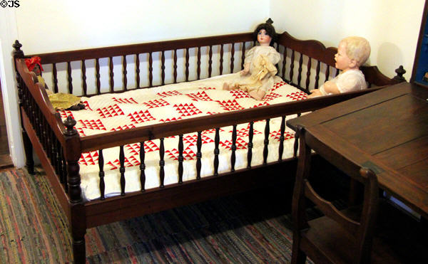 Walnut youth bed with turned spindles attrib. Johann Jahn at Museum of Texas Handmade Furniture. New Braunfels, TX.