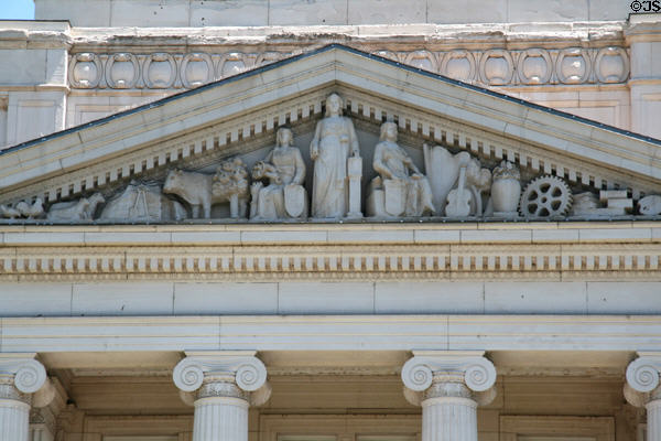 Frieze of Utah County Courthouse sculpted by Joseph Conradi with justice in center flanked by statues representing city & county plus various industries. Provo, UT.