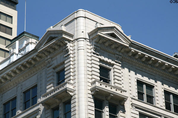 Top floor corner of Clift Building with pedimented protruding windows. Salt Lake City, UT.