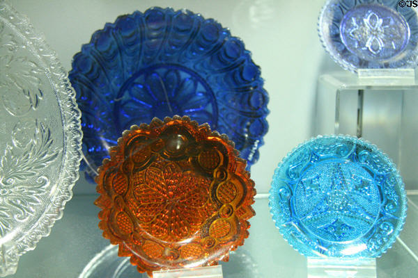 American lacy pressed colored glass plates (1830-45) at Chrysler Museum of Art. Norfolk, VA.