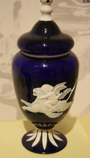 Glass covered vase with Cupid riding panther (1877) by Alphonse Eugene Lechevrel made by Hodgetts, Richardson & Son (as displayed a Paris World's Exposition of 1878) at Chrysler Museum of Art. Norfolk, VA.